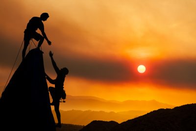 Climbing team conquers the summit.